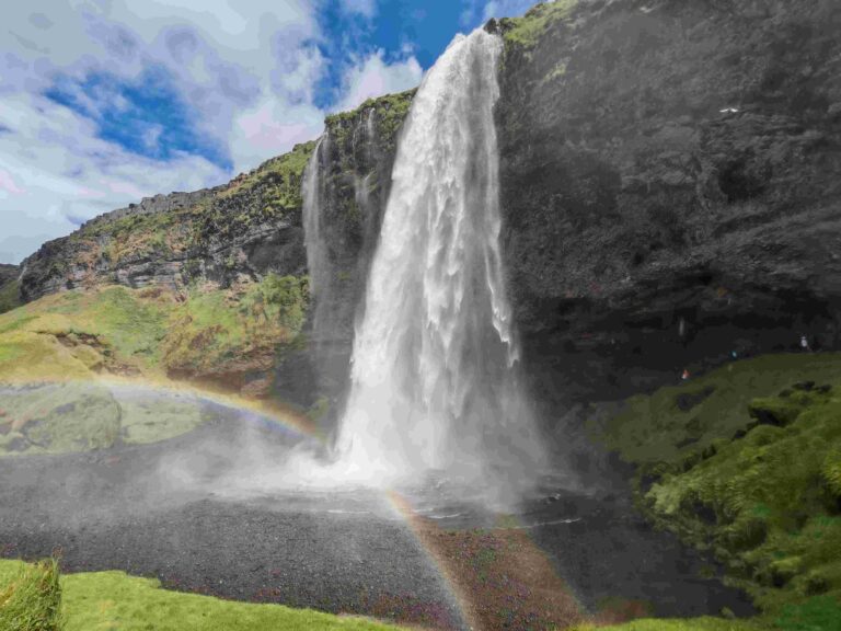 Seljalandsfoss Waterfall with Rainbow in Iceland