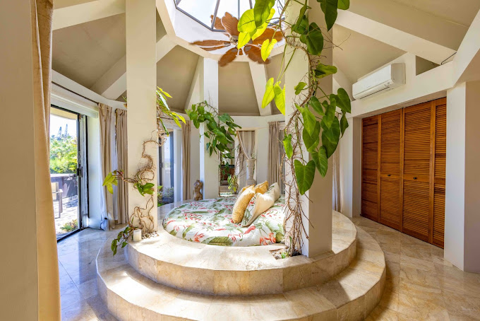 Master Suite at Hale Akua Eco-Retreat in Maui with a round king bed, part of the CGA Hawaiian Weekend Getaway accommodations