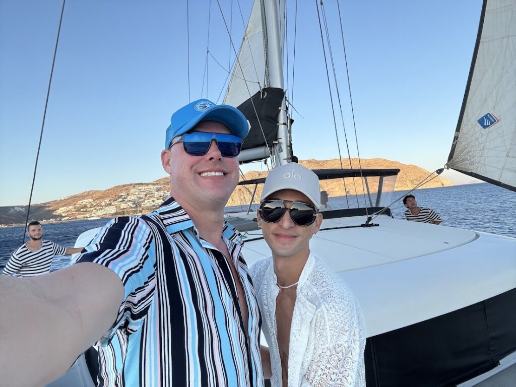 Chris and CK of Pride Adventures on Yacht. Ornos Bay, Mykonos, Greece