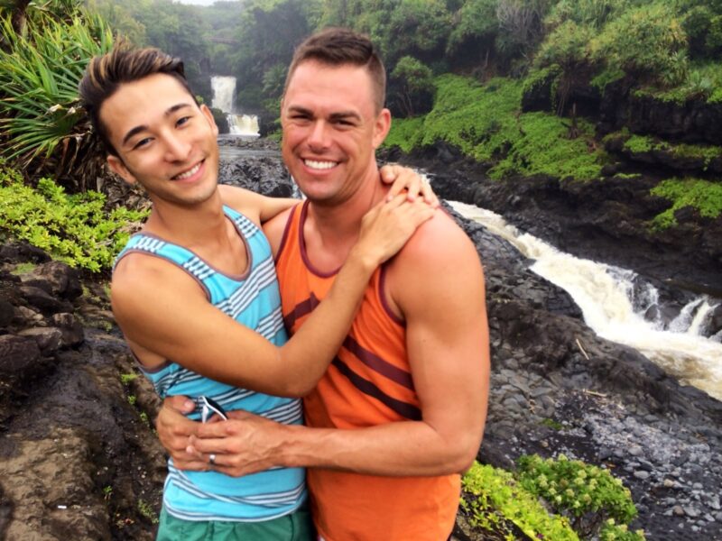 Chris and CK at a waterfall on the Road to Hana hike in Maui, part of the CGA Hawaiian Weekend Getaway