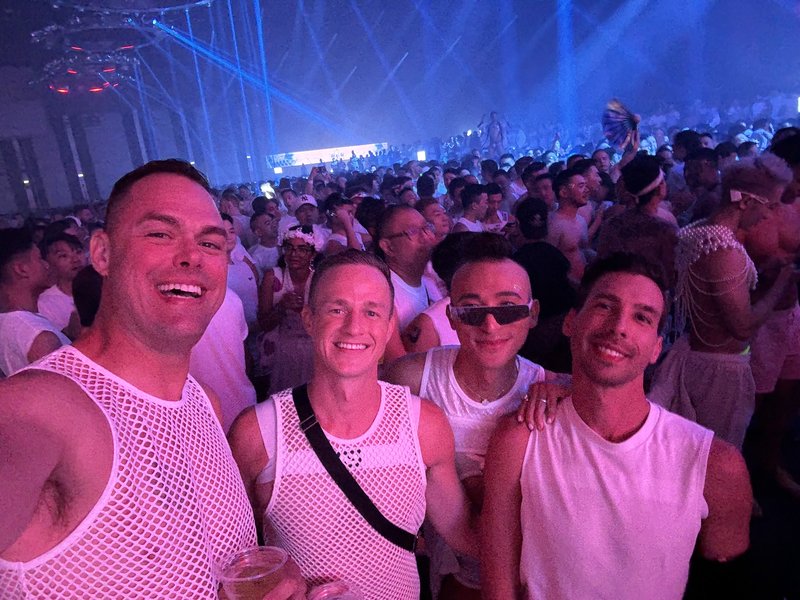 LGBTQ+ travelers at White Party Bangkok New Year’s event in statement outfits