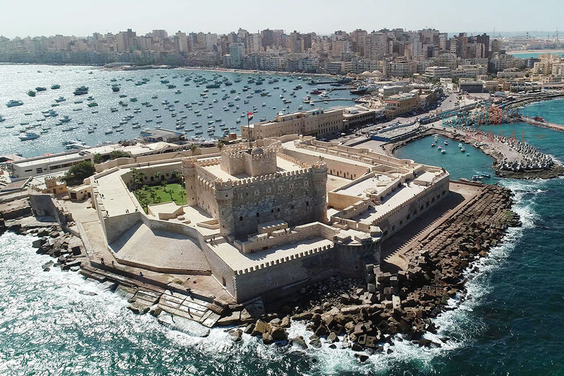 Aerial view of the Citadel of Qaitbay in Alexandria, Egypt, overlooking the Mediterranean Sea — part of the Pride Adventures Egypt & the Nile LGBTQ+ group trip.