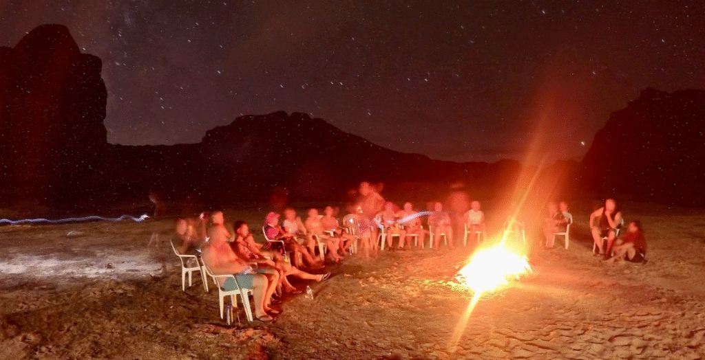 Campfire with group of gay men in Lake Powell