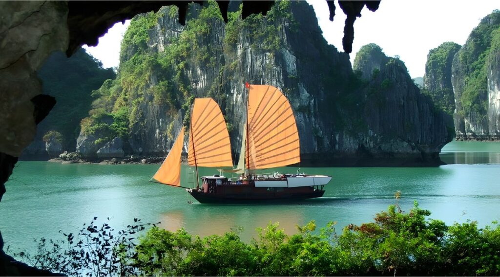 Halong Bay limestone karsts and junk boat on LGBTQ Vietnam group trip