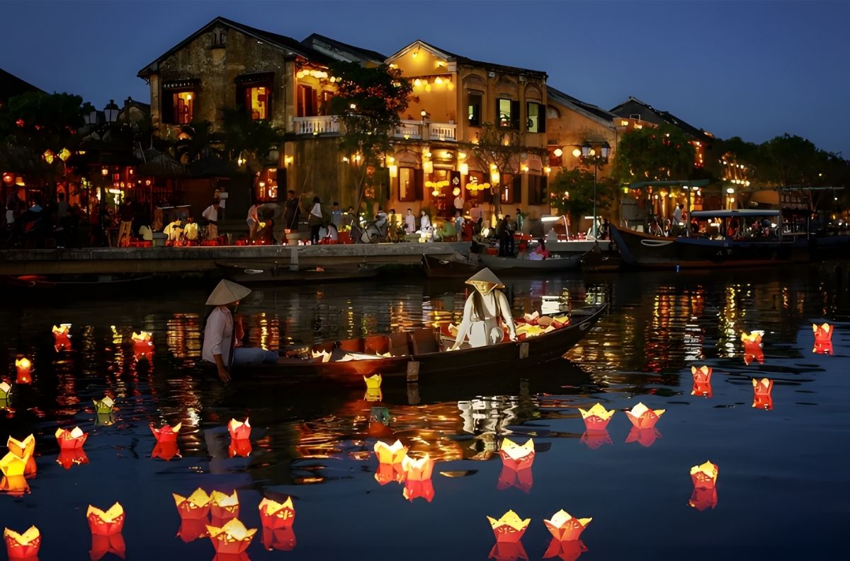 Colorful lanterns glowing over the river in Hoi An Vietnam at night