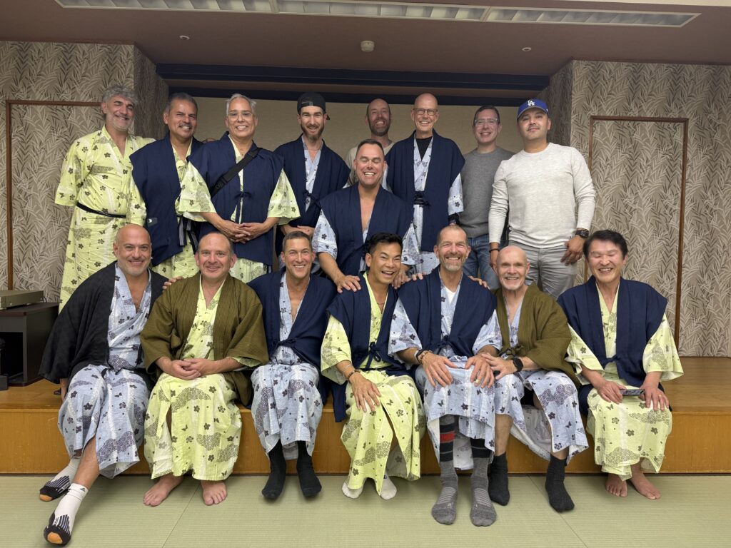LGBTQ+ travel group wearing traditional yukata robes at a ryokan in Hakone Japan