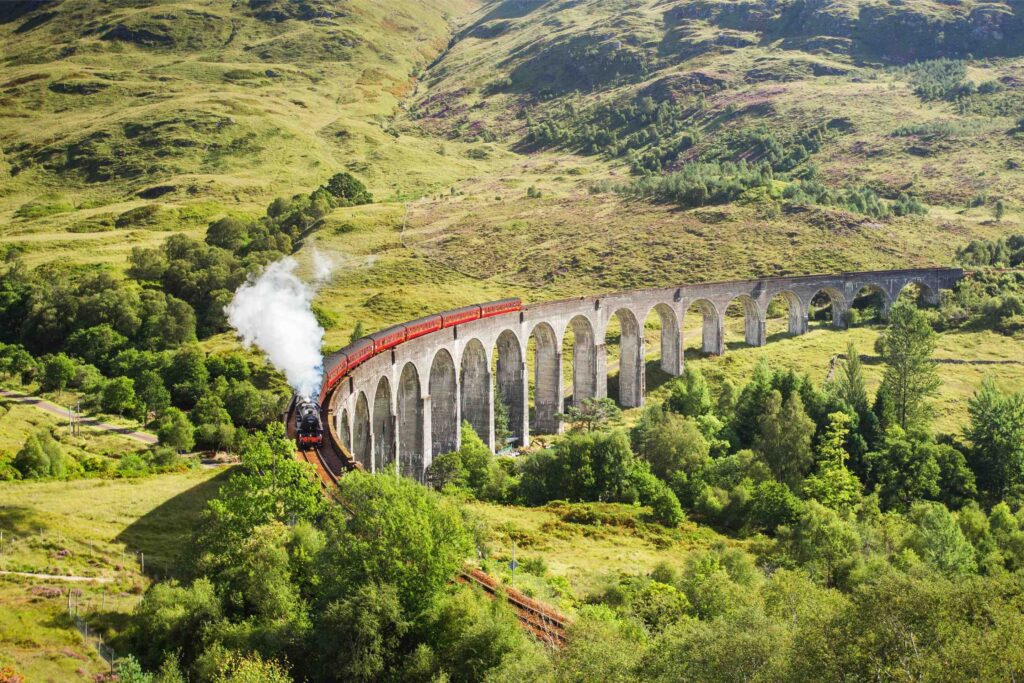 Glenfinnan Viaduct and Jacobite Steam Train in the Scottish Highlands