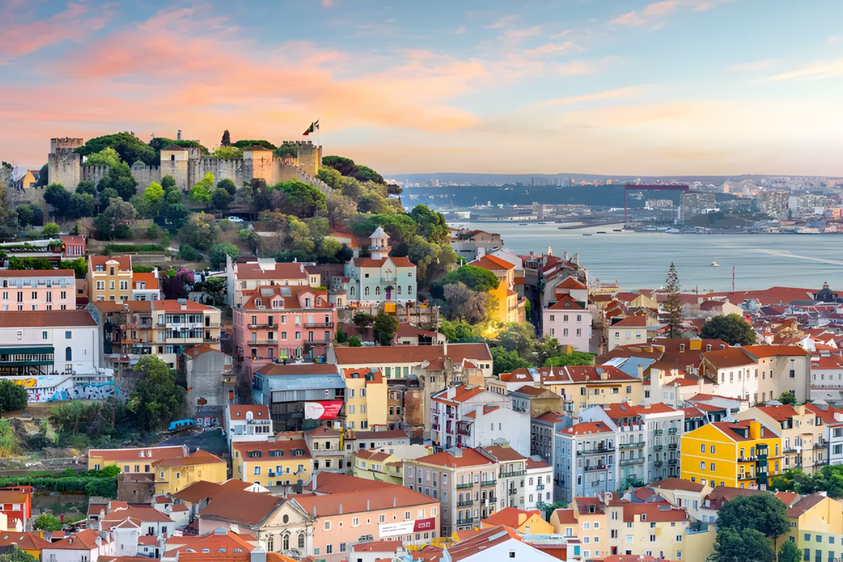 Colorful hillside view of Lisbon, Portugal on a hosted LGBTQ+ group trip with Pride Adventures