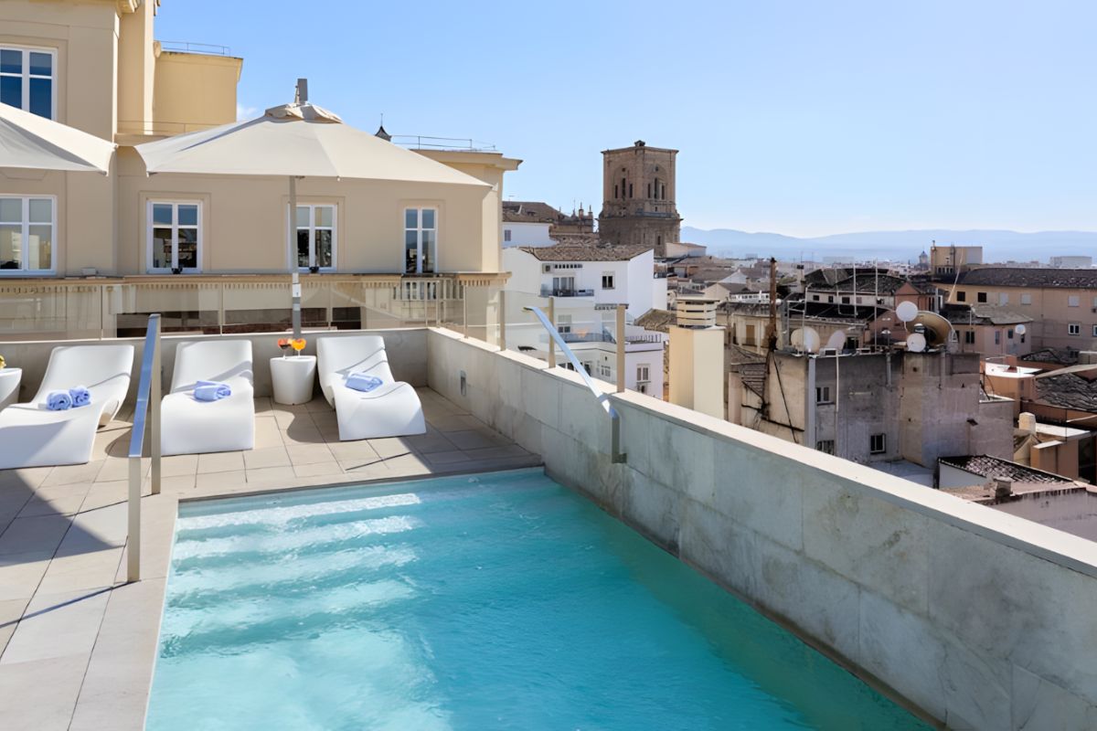 Rooftop pool at Hotel Granada Five Senses Rooms and Suites or similar in Granada, Spain