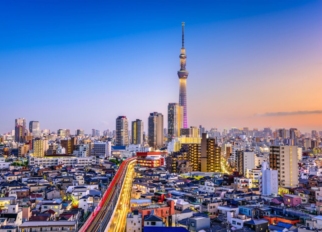Tokyo city skyline at dusk with the Tokyo Skytree lit up in Japan