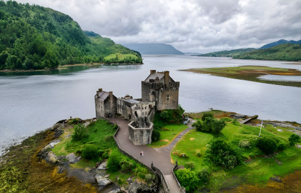 Eilean Donan Castle in the Scottish Highlands near Isle of Skye on a Pride Adventures Scotland LGBTQ+ group trip