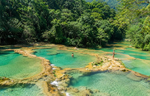 Turquoise limestone pools and jungle waterways at Semuc Champey natural monument in Guatemala