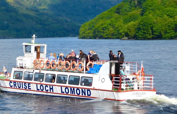 Scenic boat cruise on Loch Lomond from the village of Luss, a signature experience of the Scotland LGBTQ+ trip